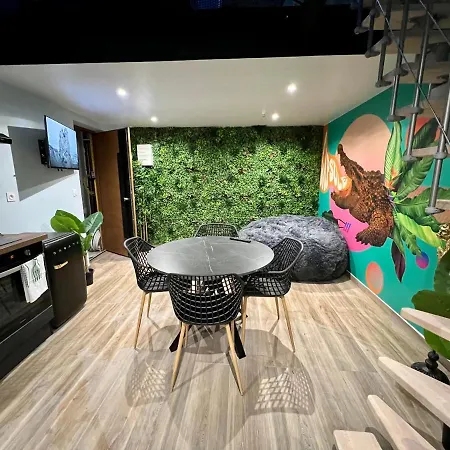 شقة Capsule Safari - Jacuzzi - Nintendo Switch - Netflix & Cinema - Pouf Geant - Filet Suspendu *